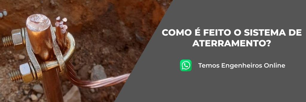 Haste de inspeção com haste de aterrametno embutido no solo e conectado com conector de aterramento.